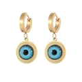 Detail view of golden hoop earrings featuring blue evil eye charms and polished metal - Blue Eye Pendant Style (E1306-GO)