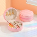 Pink round PU leather jewelry organizer case with zipper closure and storage compartments - Pink