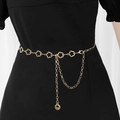 Elegant gold metal waist chain with hollow flower links and double-layered chains on black dress - Gold