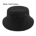 Washed black cotton bucket hat featuring vintage brass eyelets and reinforced brim stitching - One Size / Serge Black