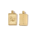 Macro view of 18k gold plated stainless steel Taurus zodiac pendant with embossed bull - Taurus