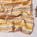Soft muslin cotton baby swaddle blanket featuring vibrant colorful rainbow stripes - Multi-color Rainbow Stripes
