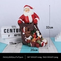Resin Santa Claus figurine with gift sack, 32cm tall decorative Christmas ornament - Counting Gifts Santa Claus