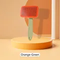 Brosse de toilettage ergonomique orange et verte avec bouton d'éjection des poils - Type standard / Orange Vert