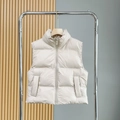 Gilet matelassé beige pour femme avec col montant et fermeture éclair centrale - XS / Blanc