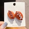 Cute resin hot dog hair clip featuring realistic food design on white display card - Hot Dog