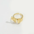 Adjustable golden bow-shaped open ring made of polished metal for women on white background - Bowknot (JZ0521-3)