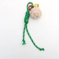 Green woven nylon rope charm with a beige plush ball and yellow bell for bags - Green Rope + Plush Ball
