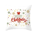 Macro shot of green Christmas pillow cover with snowflake patterns and Merry Christmas text - Holiday Snowflake Gift Box - White/Red/Green