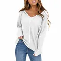 Detail of white waffle knit fabric texture on a women's casual zip-up hooded jacket - White