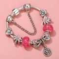 Macro detail of silver-plated DIY bracelet with pink crystal beads and heart charms - Sl023318/1216-12 / 17cm