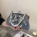 Bolso de fiesta negro con pedrería de colores, cadena de perlas y gran lazo de cristal - Colorido