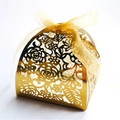 Laser cut golden wedding candy box with elegant hollow rose patterns and yellow ribbon bow - Rose Hollow Out Style (XTH-94) / 50 Pieces/Pack (6*6*8CM) / Reflective Gold
