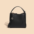 Minimalistische schwarze Leder-Eimertasche mit goldenen Details und Griff - Schwarz