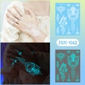 Luminous lace butterfly tattoo stickers JSN-042 showing white day and glowing blue night effects - JSN-042 (Luminous Lace Butterfly)