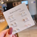Close-up of 6-pair mini stud earring set with butterflies and stars on a weekly card - E1537-1 Crown Leaf Star Style