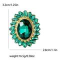 Vintage emerald crystal sunflower brooch in gold finish with precise size and weight specs - Green