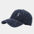 Detail view of faith cross embroidery on navy cotton baseball cap with stitch texture - Navy Blue
