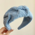 Knitted blue twist headband for women in soft mohair fabric for autumn and winter style - Light Blue