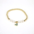 Close-up of pearl and gold bead bracelet featuring a blue heart-shaped pendant - Blue
