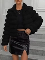 Detail of short black faux fur jacket with zipper paired with crocodile skirt - S / Black