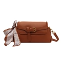 Caramel brown pebbled leather crossbody bag with decorative scarf and gold buckle hardware - Brown