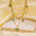 Close-up of double layer gold-plated steel necklace with heart-shaped evil eye pendant - QYH1184 Evil Eye Heart Double Chain Necklace (Gold)