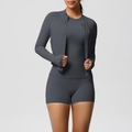 Three-piece dark grey athletic set featuring a zip jacket, slim top, and high-waist shorts - Graphite Grey