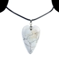White heart-shaped natural stone pendant necklace with gray marble texture on neck bust - Howlite