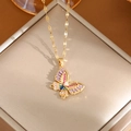 Golden butterfly necklace with rainbow zircon inlay displayed on jewelry box - A0126 Gold Colorful CZ Butterfly