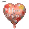 Detail of 18 inch heart-shaped foil balloon with I Love You print and floral accents - 18 Inch Valentine's Heart F3186