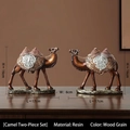 Set of two modern resin camel ornaments with wood grain finish and silver saddles - Camel Ornaments Set of 2 (Wood Grain)