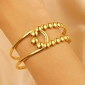 Minimalist double-layered gold open cuff bracelet with metallic sphere accents - Cross Bead Decoration (1467)
