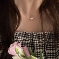 Elegant silver chain necklace featuring irregular square pendant on a female model - Silver Irregular Square Necklace (XL1777)