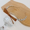 Silver crystal headband featuring clear rhinestones and a brown leather bow detail - Khaki with Bowknot