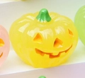 Halloween glowing yellow pumpkin figurine with carved triangle eyes and smiling face - Luminous Light Yellow (Yellow Expression)