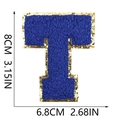 Close-up of blue chenille letter T patch with gold sequin border, 8cm tall DIY applique - Letter T
