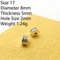 Macro detail of 8mm vintage Tibetan silver spacer beads with hollow pattern for DIY jewelry - 17#