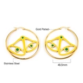 Macro shot of 49.5mm gold plated stainless steel hoop earrings with green enamel accents - Green Element Hoop Earrings