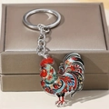 Acrylic keychain featuring colorful American folk art rooster design on metal ring - Folk Art Rooster