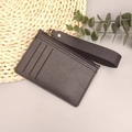 Slim dark brown pebble leather card holder with wrist strap and gold zipper detail - 019 Black