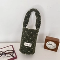 Detail of green plush cup holder bag with white polka dots and soft fabric handle - Green (White Dots)