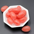 Polished pink rose quartz egg-shaped stones displayed in a white decorative bowl - Watermelon Stone (Synthetic) (1pc)