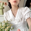 Elegant pearl necklace paired with a white lace-trimmed shirt for a French chic autumn look - SY306【6mm Pearl】