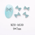 Detail showing 9x7mm light blue bow nail charms with rhinestones on silver alloy base - Aqua Blue Alloy Base Bow (A630)