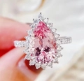 Elegant pear-cut pink cubic zirconia halo ring with sparkling pavé setting in silver - Ur0671