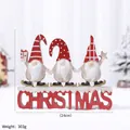 Wooden Christmas gnome decor with red CHRISTMAS base measuring 24cm by 17.5cm - Three Gnomes CHRISTMAS Lettering Sign (HG18-750)