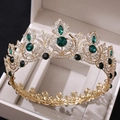 Detail of luxury bridal crown with emerald crystals and rhinestones in a beige box - Gold Clear and Green Rhinestone