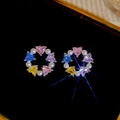 Macro shot of silver stud earrings with colorful heart zircons and white pearls - Heart Wreath Style / Silver - Rainbow
