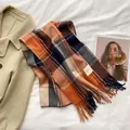 Classic plaid scarf in orange and navy blue with tassels, paired with wool coat - Classic Plaid Orange